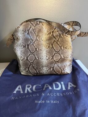 Arcadia handbag made in Italy featuring a snakeskin-glitter style pattern.